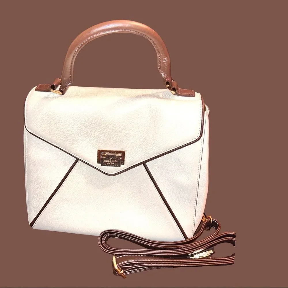 Kate Spade envelope purse. Cream with brown trim . Euc!